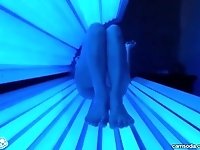 teen latina college student gives  lesbian pussy a massage in tanning bed